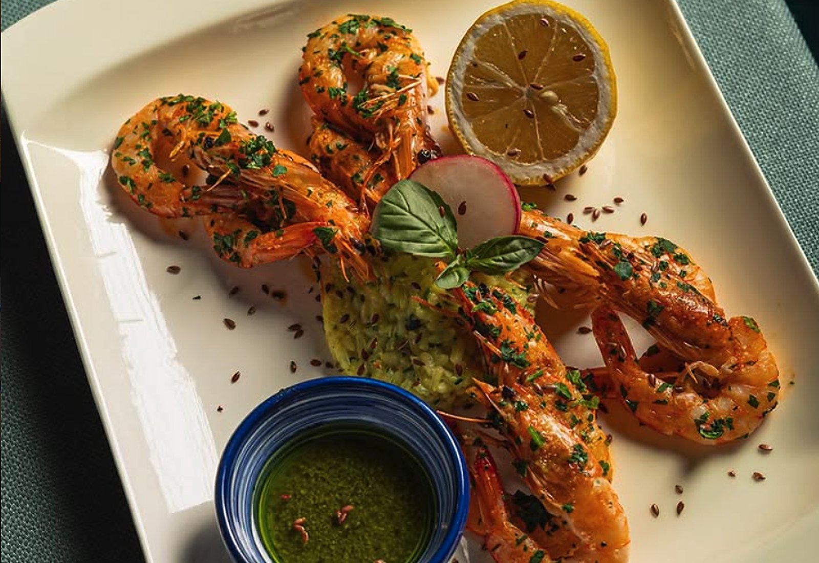 Grilled tiger prawns with saffron rice, served at Melaverde near Gjilan
